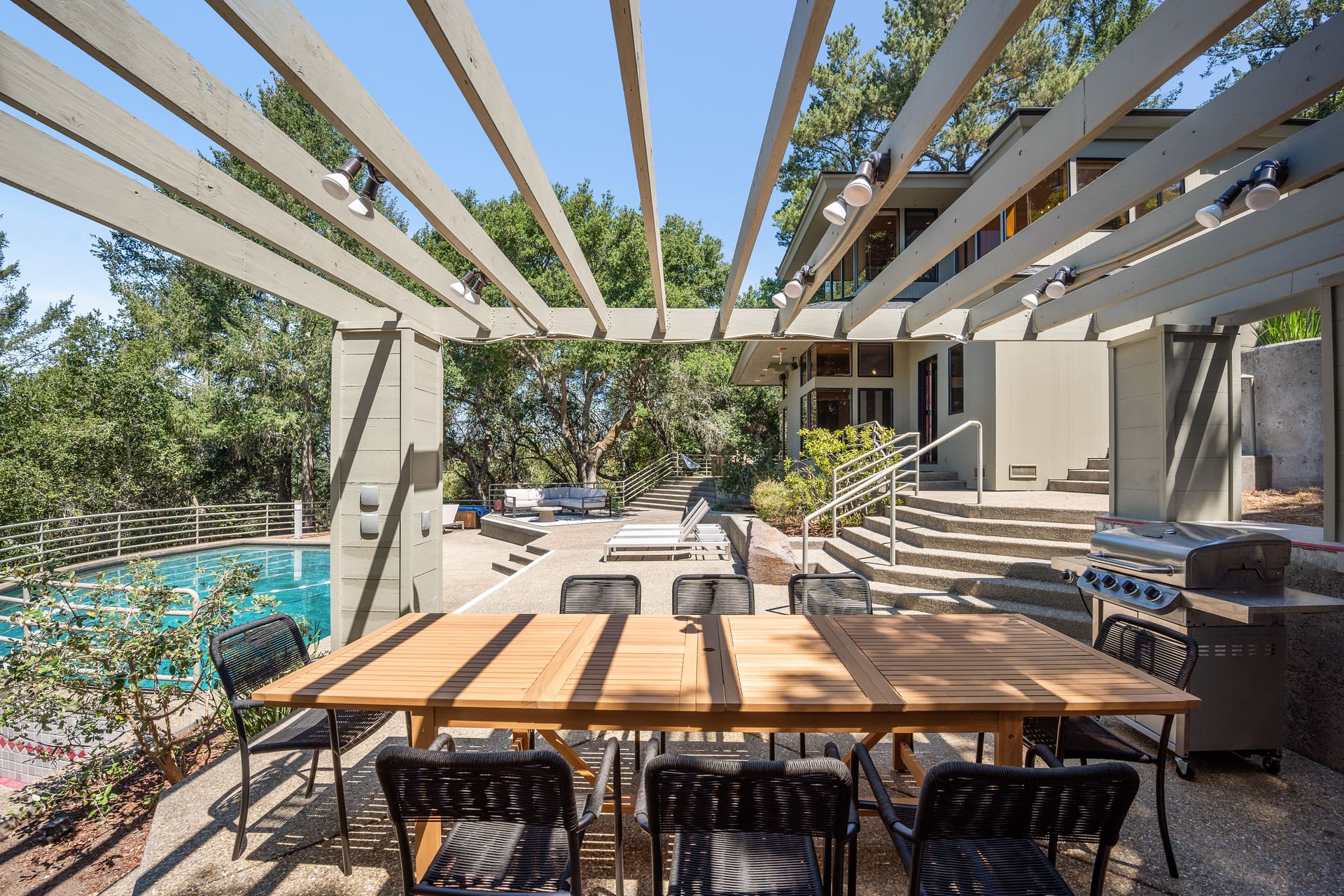 Titan — Dinner Under the Pergola